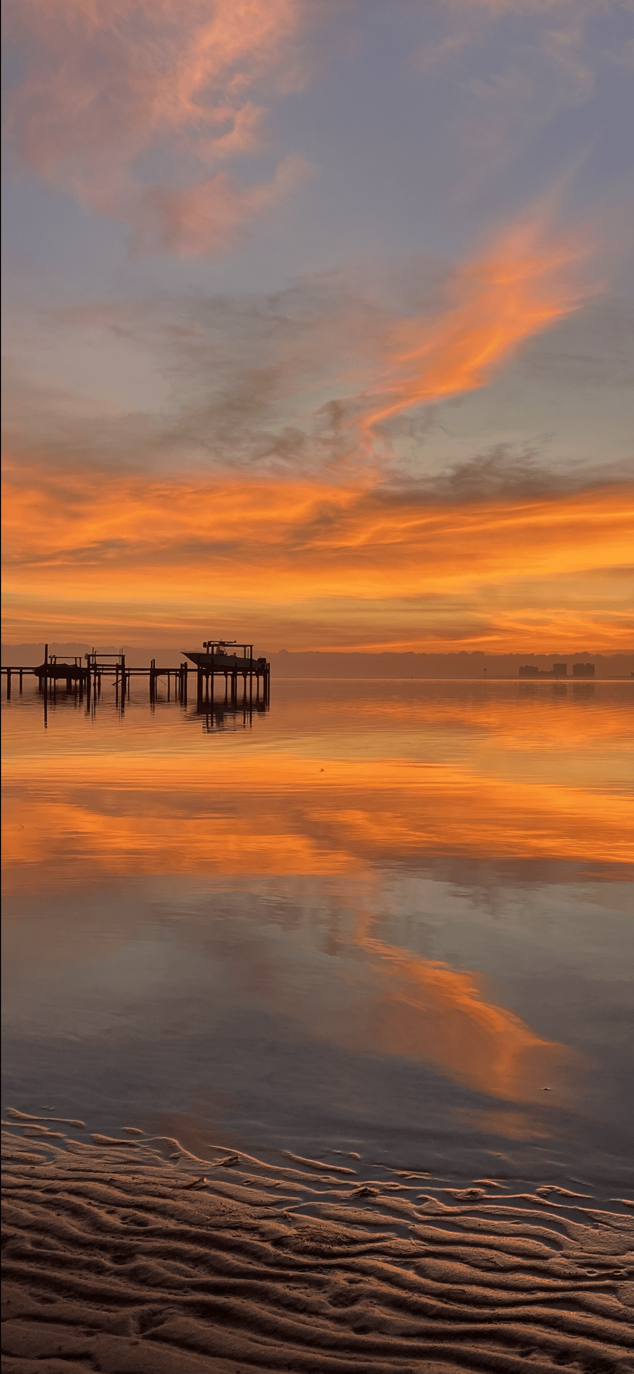 Today's Photo of the Day comes from Frank Lundie. Frank took this awesome photo of a sound-side sunrise in Navarre. 🌅