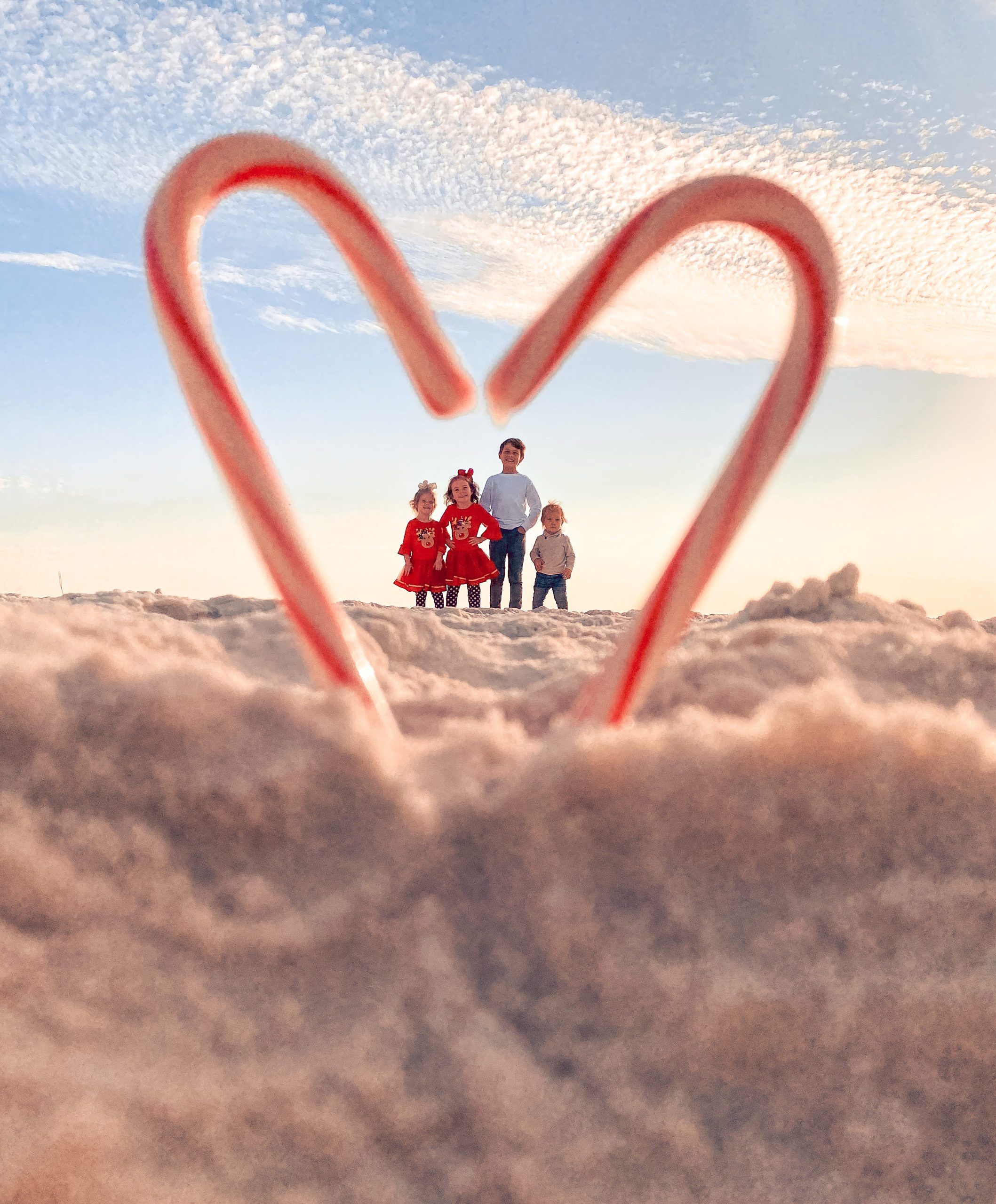 Today's Photo of the Day comes from Brittany Wheelright. Brittany took this festive photo of her children, Aidyn, Arya, Abree and Allius on Navarre Beach. 🎅