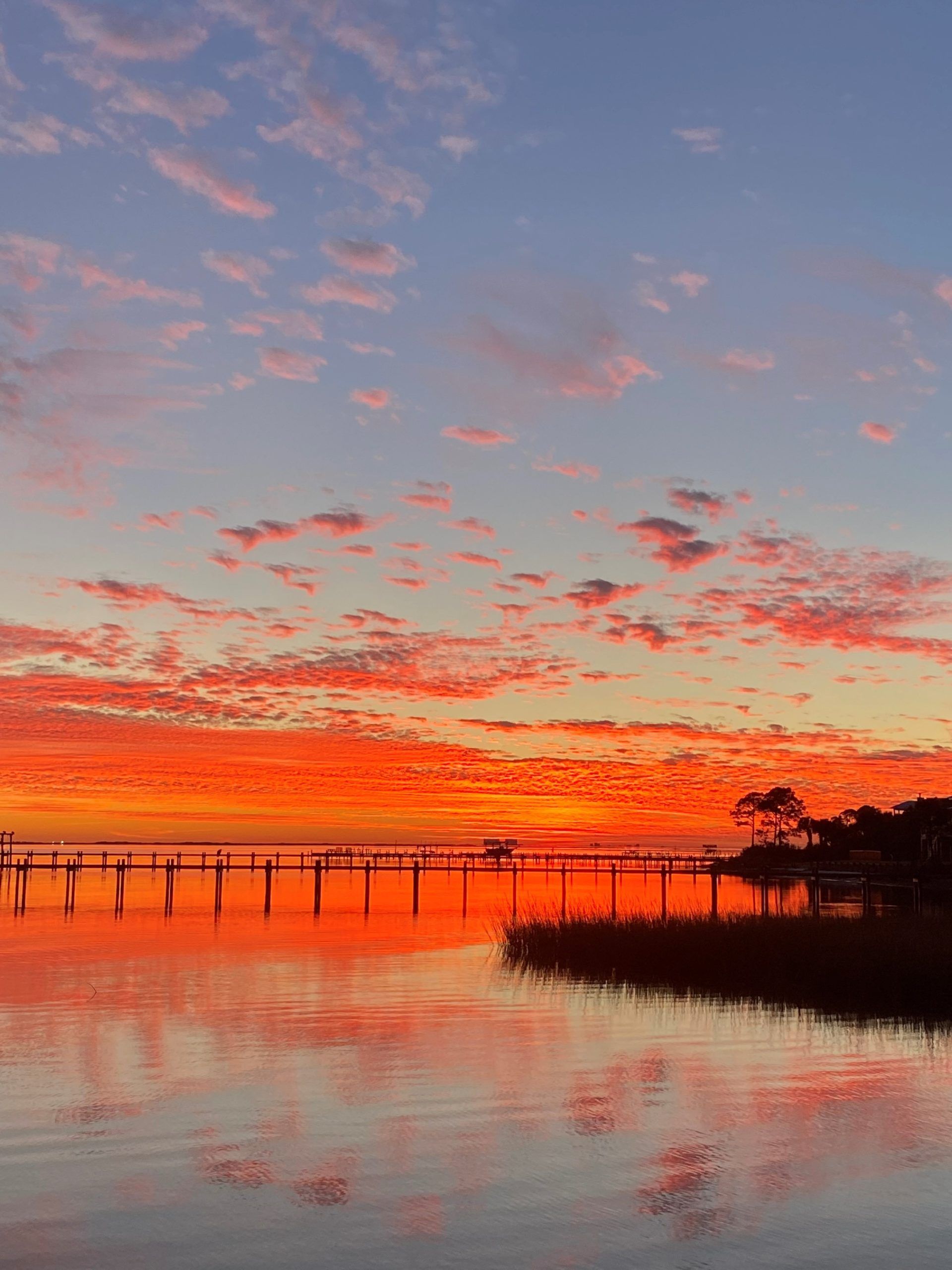 Today's Photo of the Day comes to us from Theresa Lawson. 
She said, "Sunset glory! Over the sound by Lighthouse Pointe! Blessed to live here!" 🌅