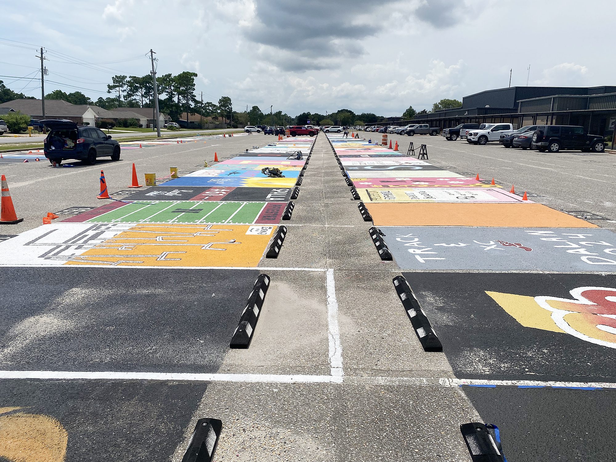 Navarre High students show artistry with painted parking spaces